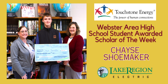 3 people holding large novelty check