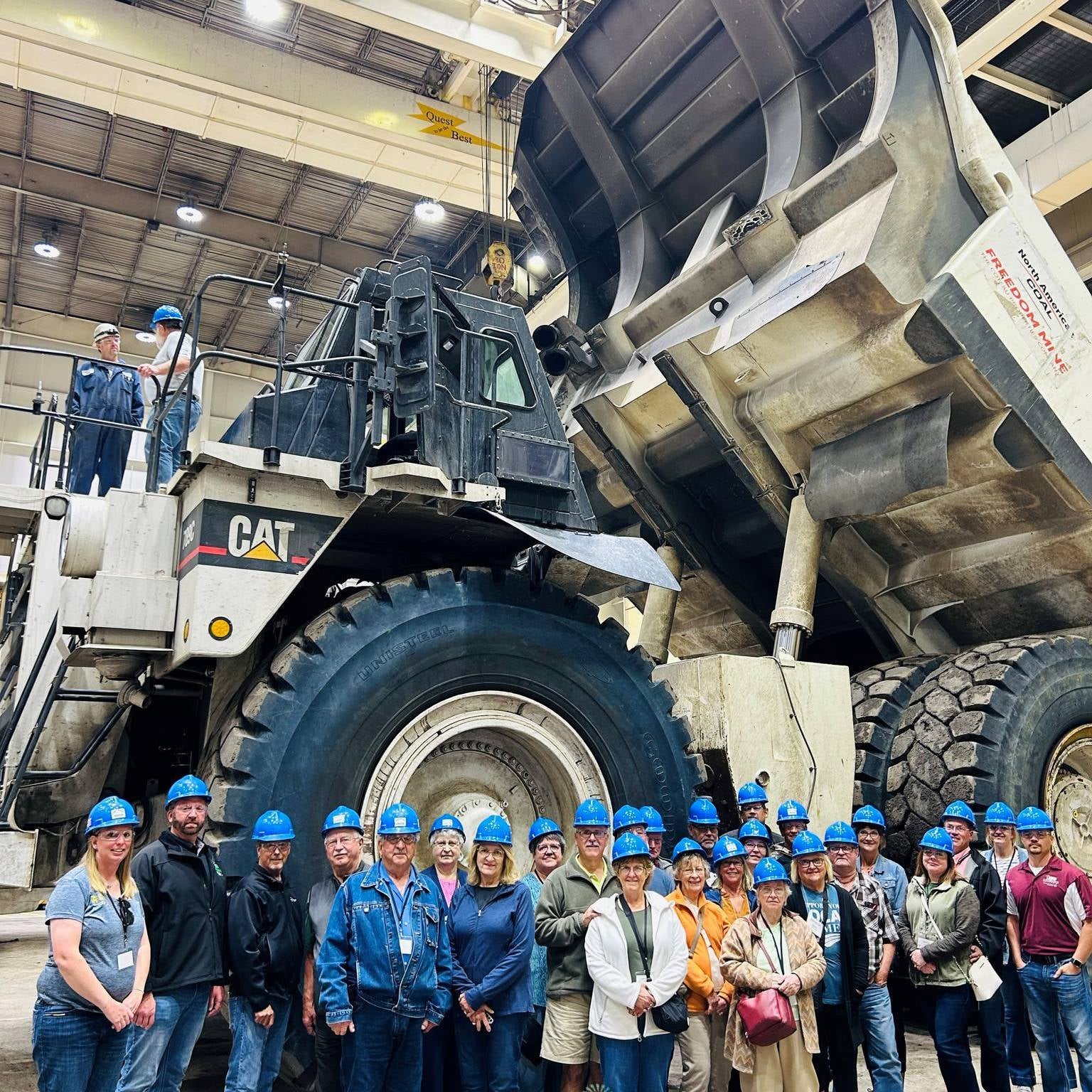 tour group with coal truck