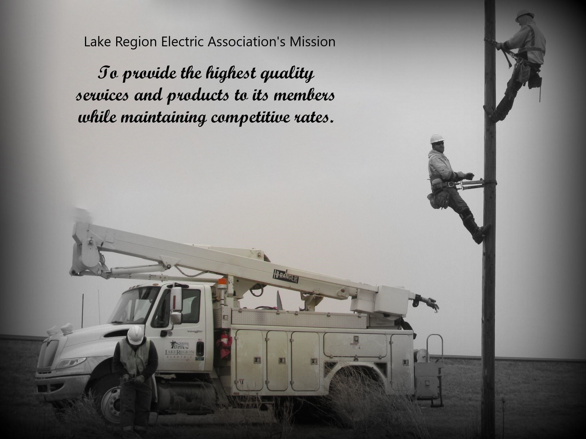 truck men on pole with mission statement text