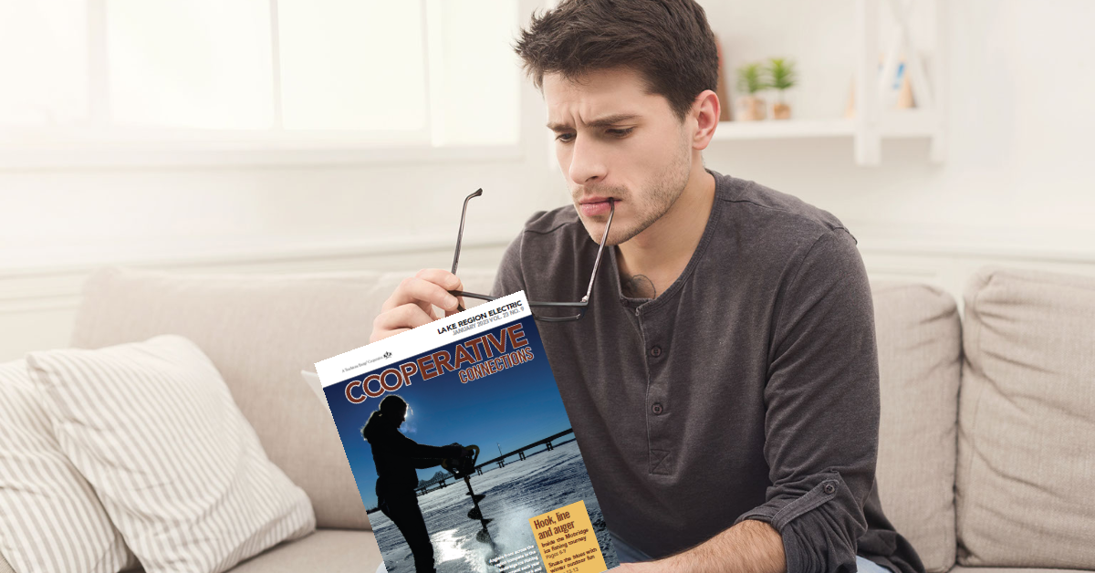 man reading magazine